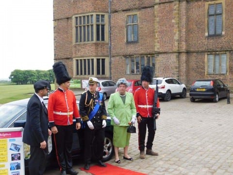 "Liz and Phil" arrive at Temple Newsam in the Benidorm Jag, to meet their loyal subjects